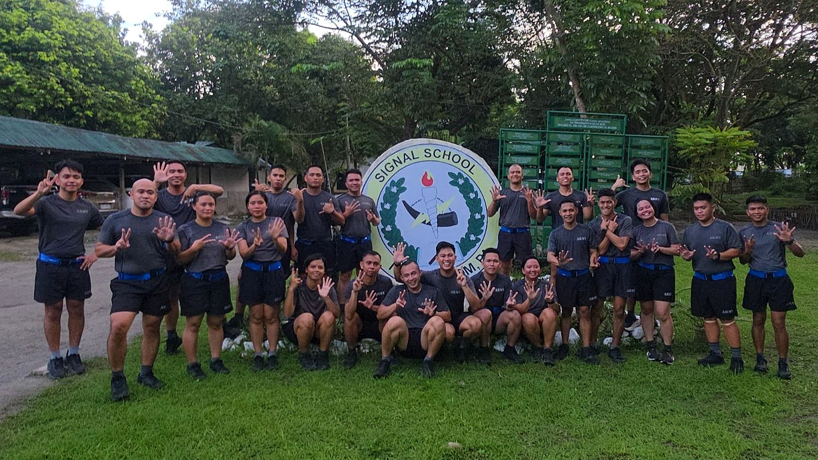 Bandwidth Brothers, SOAC 52 - 2026, in PT uniform at the Signal School emblem